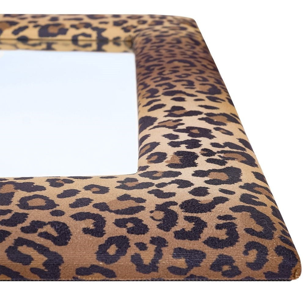 Wall mirror in wooden frame with velvet and leopard pattern