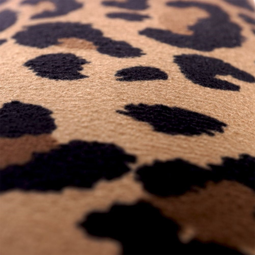 Wall mirror in wooden frame with velvet and leopard pattern