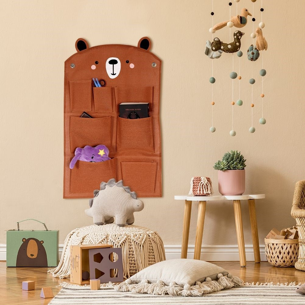 Wall organizer with bear motif and 7 pockets