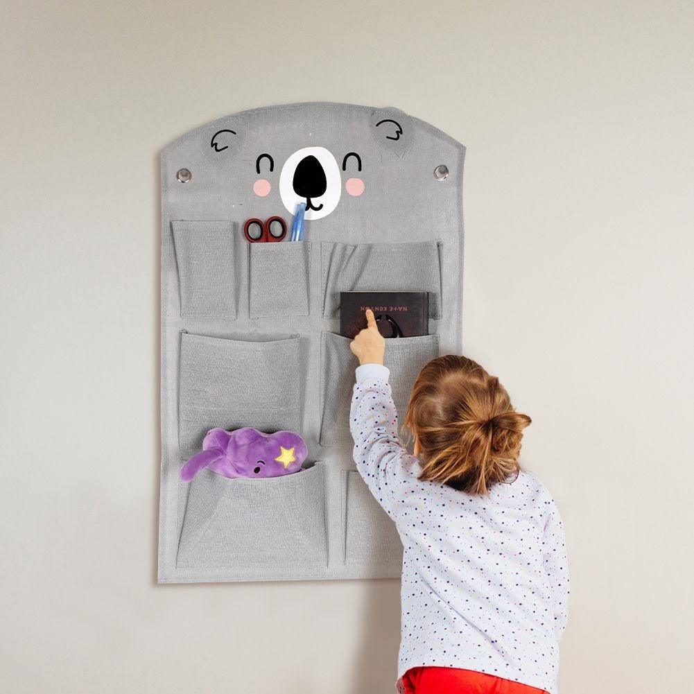 Wall organizer with koala motif and seven pockets for children