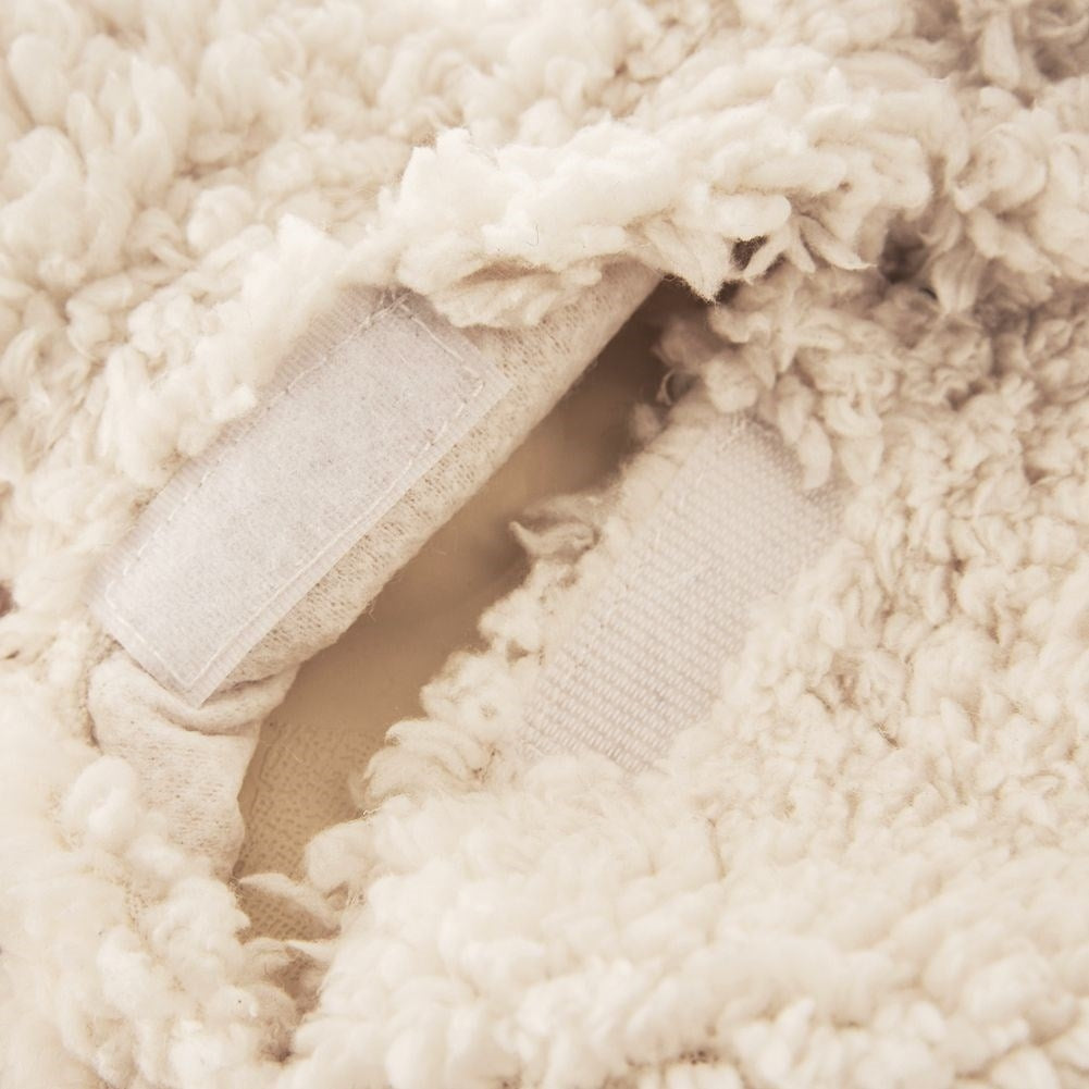 Warming bottle with soft sheepskin cover for relaxation