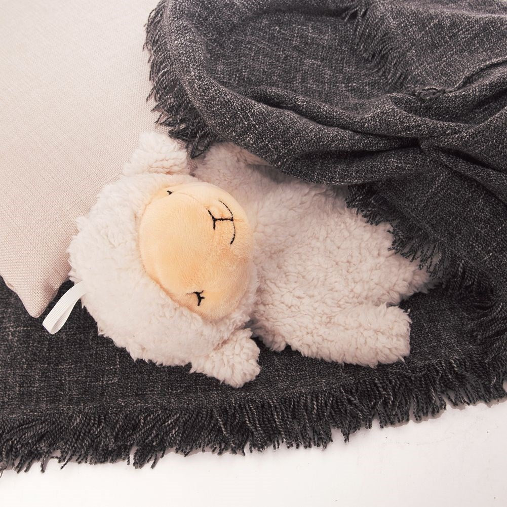 Warming bottle with soft sheepskin cover for relaxation