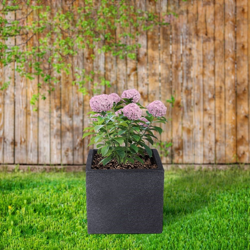 Weather-resistant flower pot in stone imitation for outdoor use