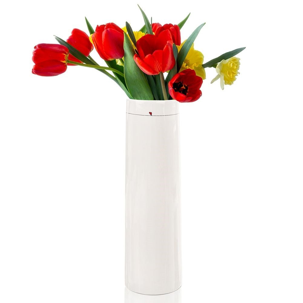 White ceramic vase with subtle floral heart motif