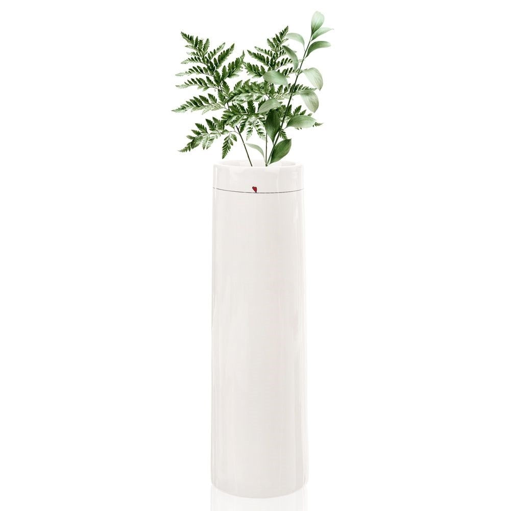 White ceramic vase with subtle floral heart motif