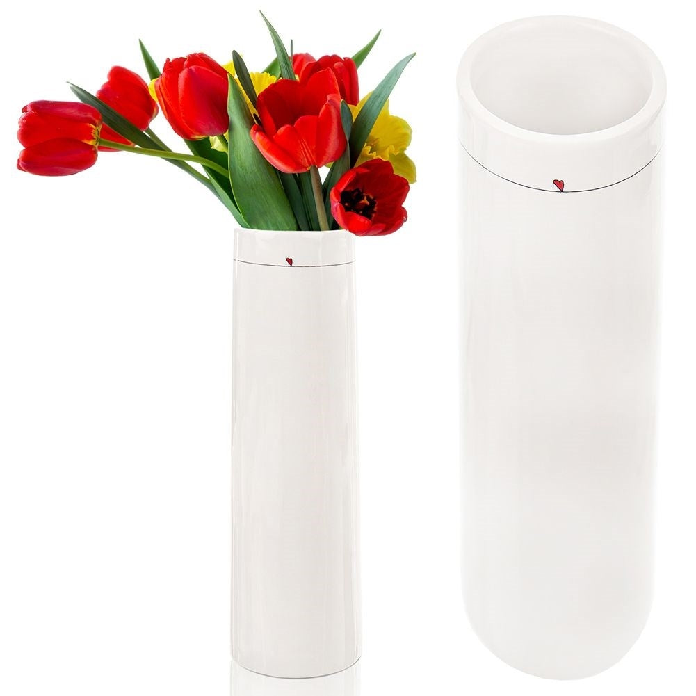 White ceramic vase with subtle floral heart motif