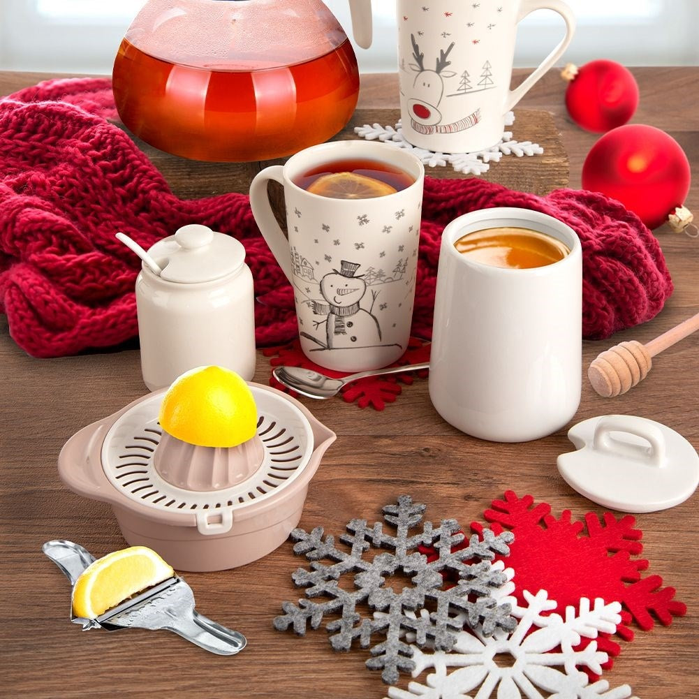 White felt coasters in snowflake shape for glasses and pans
