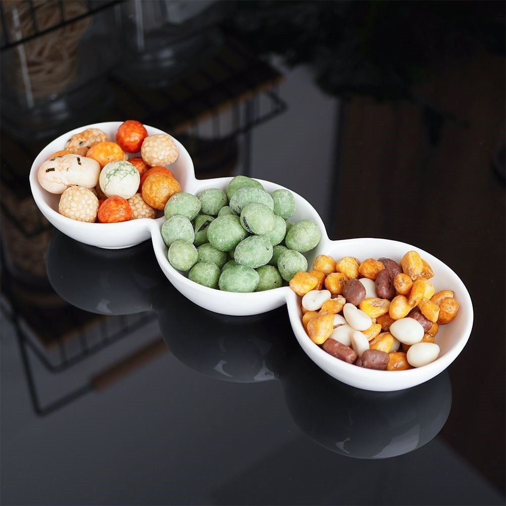 White porcelain bowl with three compartments for snacks and dip