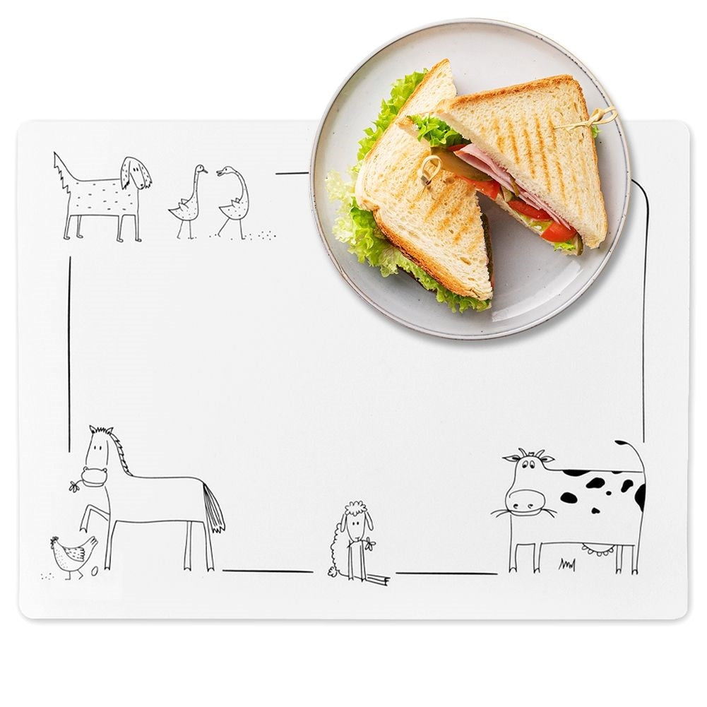 White rectangular plastic placemat with animal motif