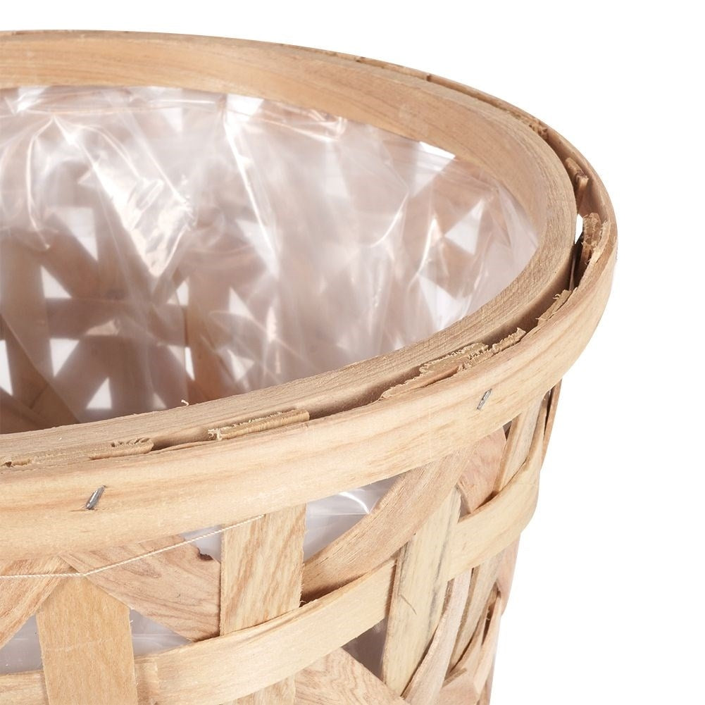 Wicker flower pot on wooden legs for boho style, live/artificial plants