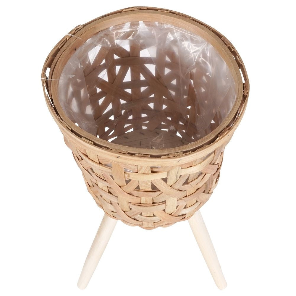 Wicker flower pot on wooden legs for boho style, live/artificial plants