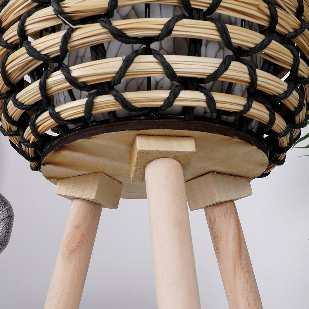 Wicker flower pot with wooden legs for boho decor