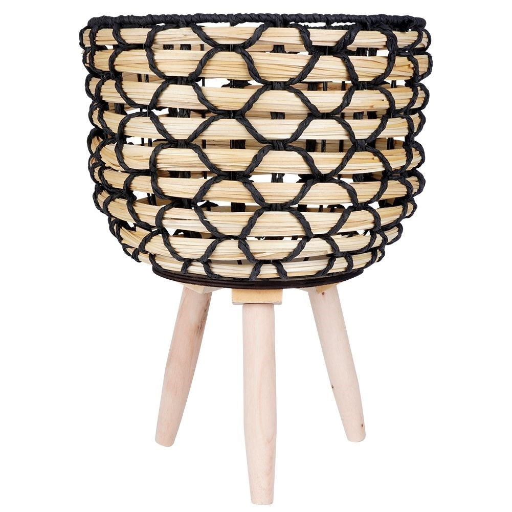 Wicker flower pot with wooden legs for boho decor