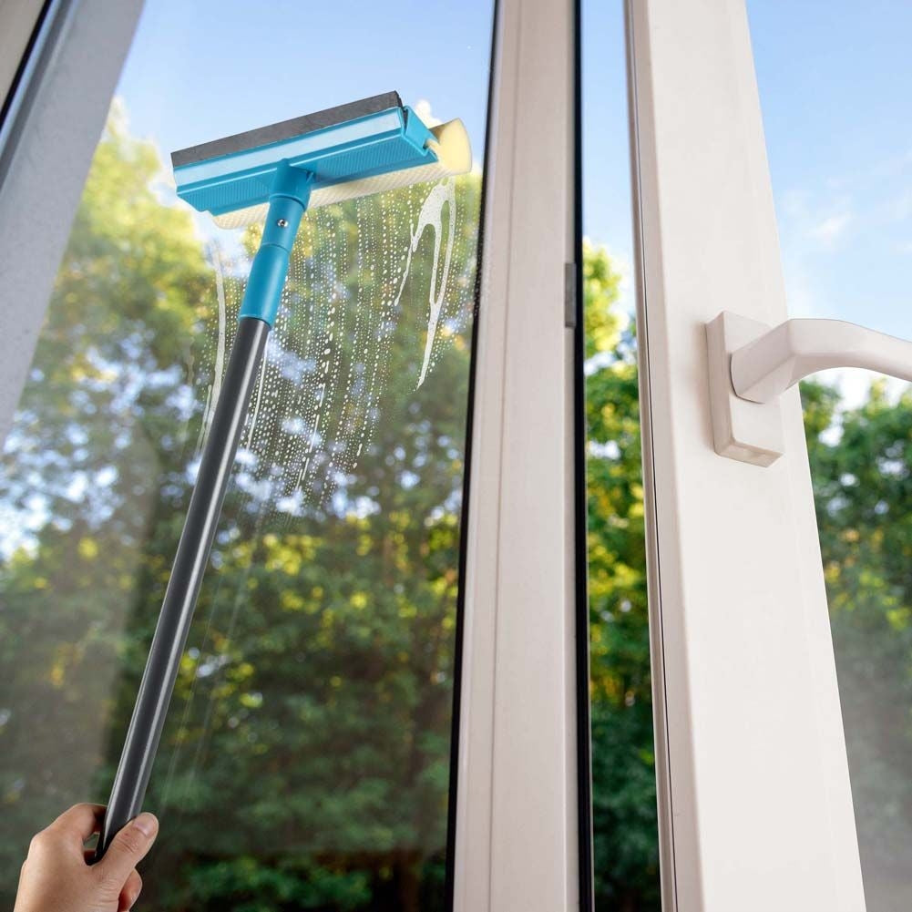 Window scraper with adjustable telescopic handle