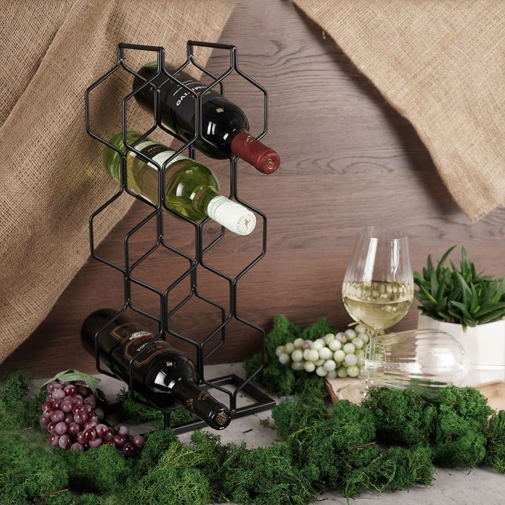 Wine rack in black metal for 8 bottles, floor or bench