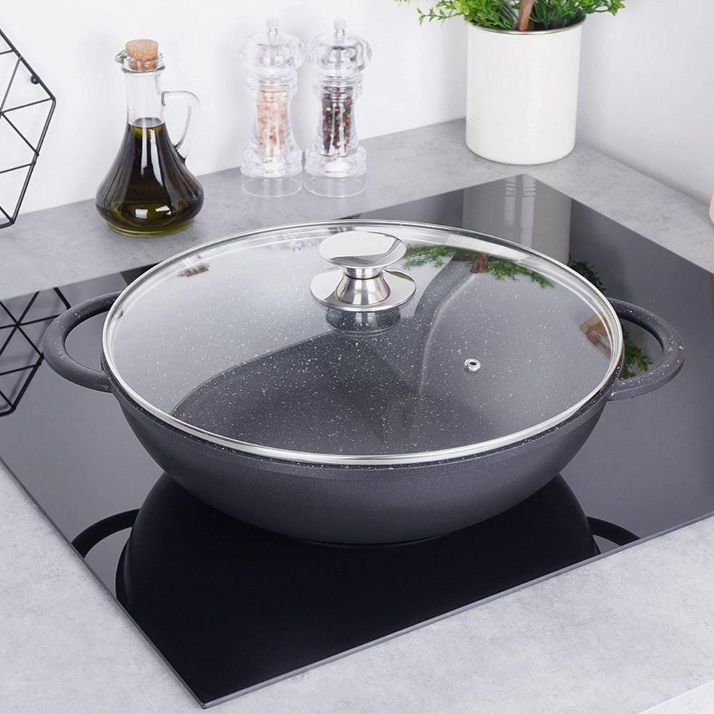 Wok with Pfluon Granite. Perfect for all stoves & dishwasher safe.
