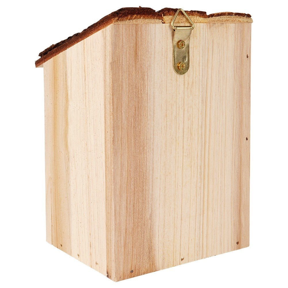 Wooden birdhouse with entrance opening for the garden