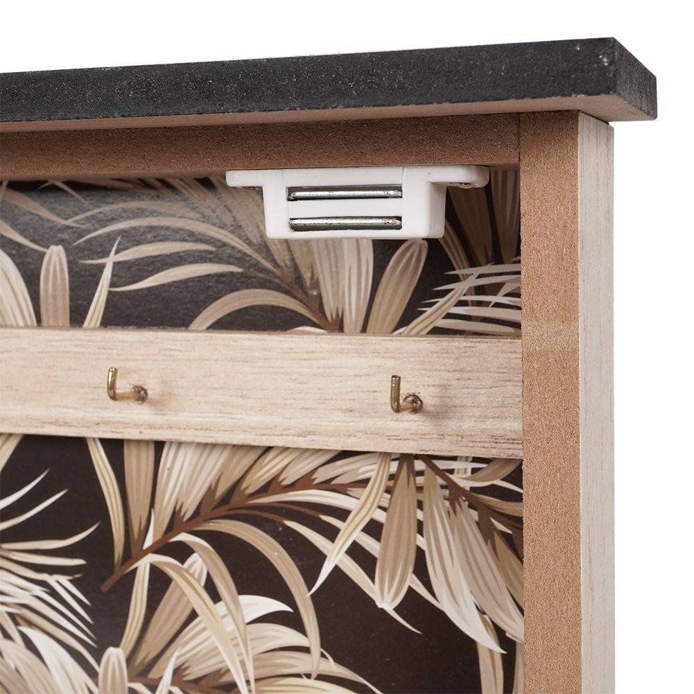 Wooden cabinet with print and six golden hooks for keys