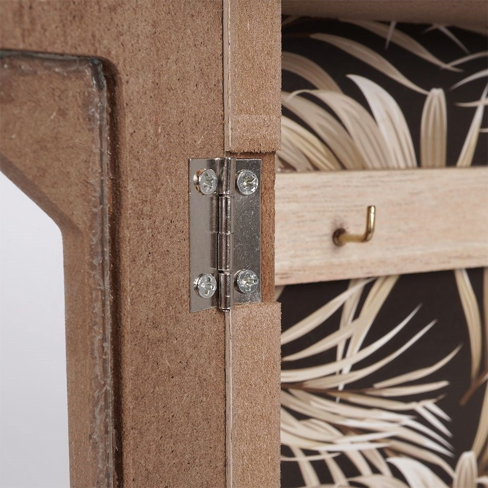 Wooden cabinet with print and six golden hooks for keys