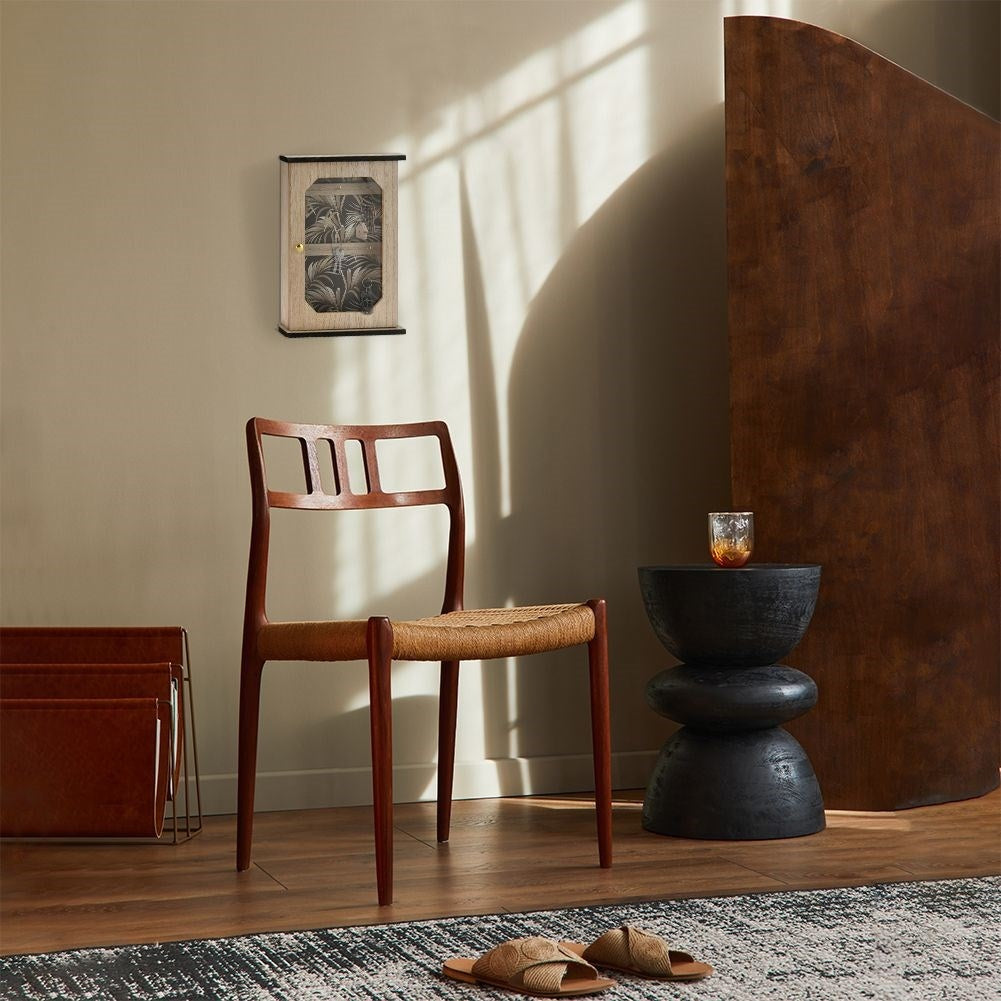 Wooden cabinet with print and six golden hooks for keys