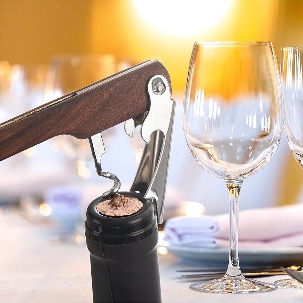 Wooden cork screw with steel, foil cutter and varnish knife