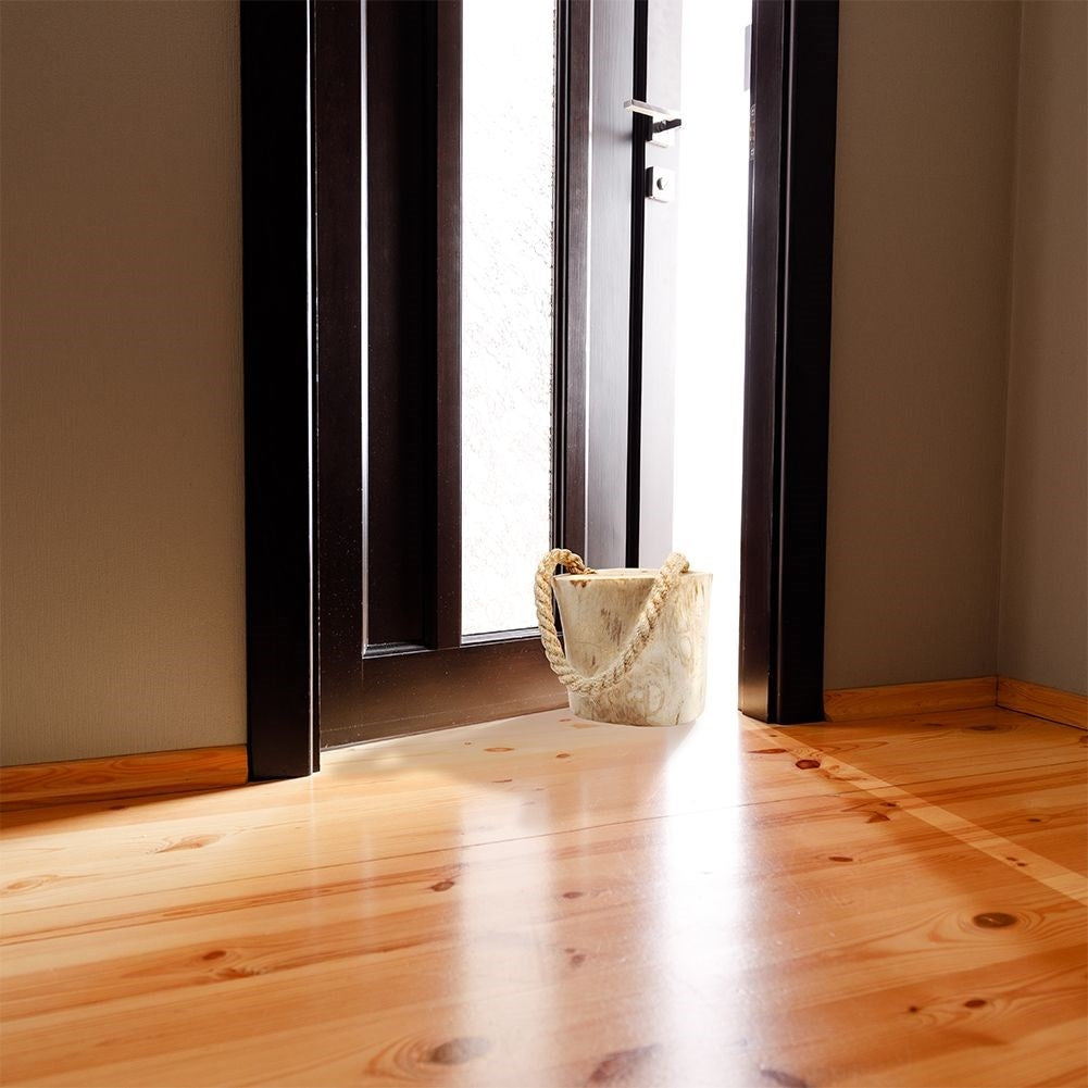 Wooden door stop - Protects walls and doors