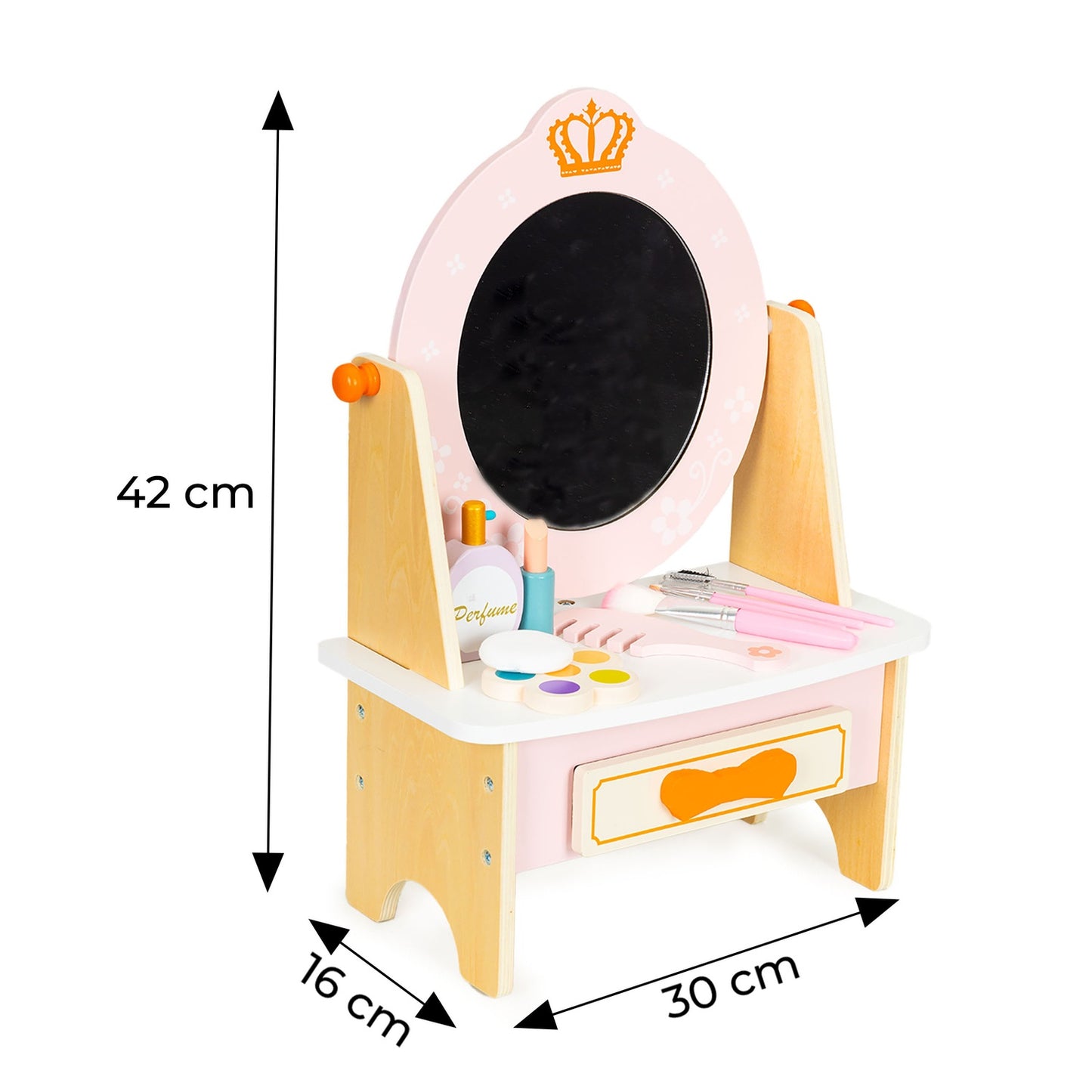 Wooden dressing table with pink children's accessories