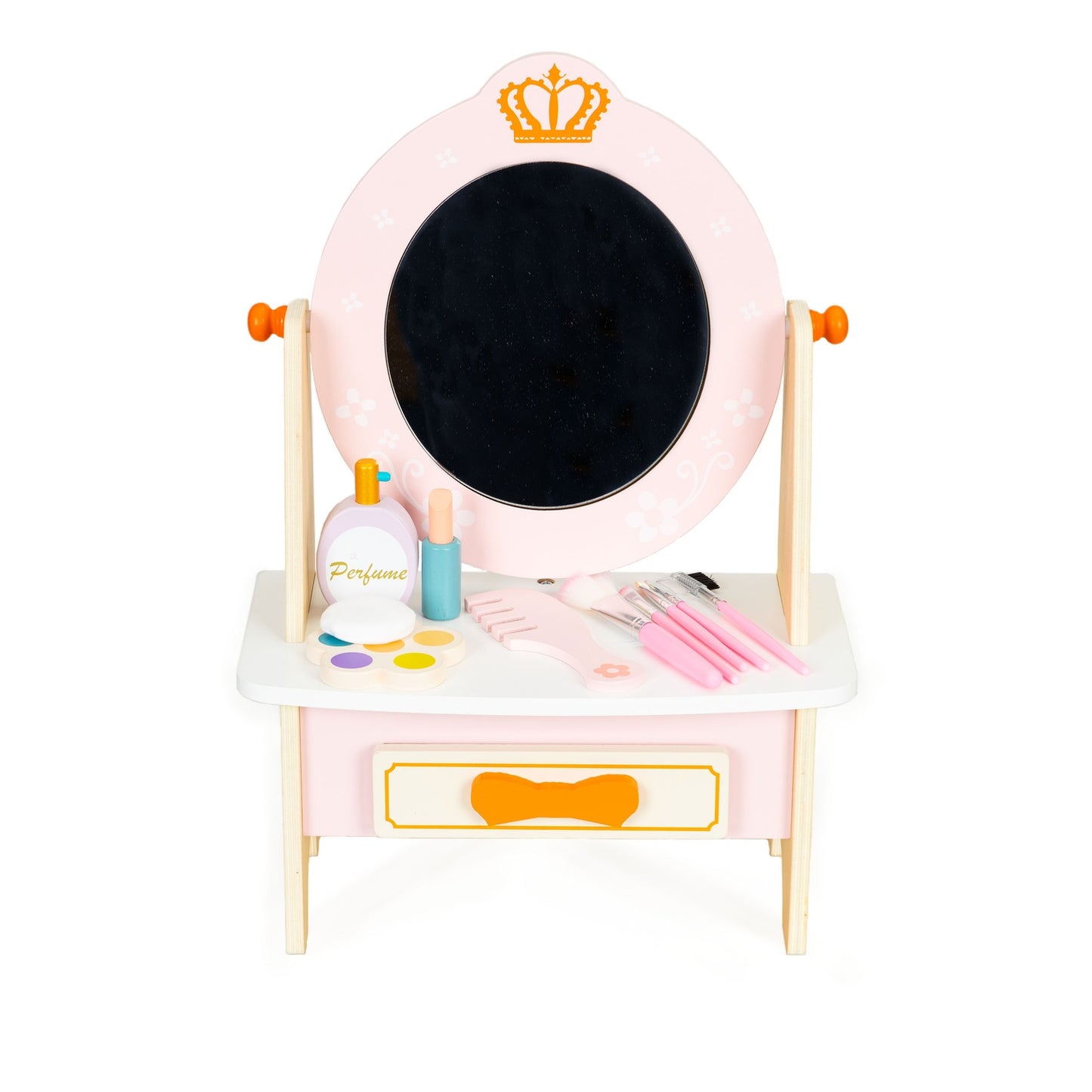 Wooden dressing table with pink children's accessories