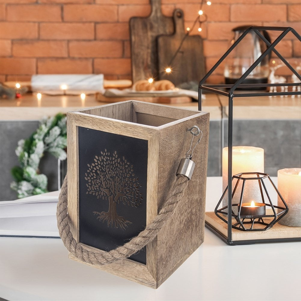 Wooden lantern with tree motif for indoors and outdoors