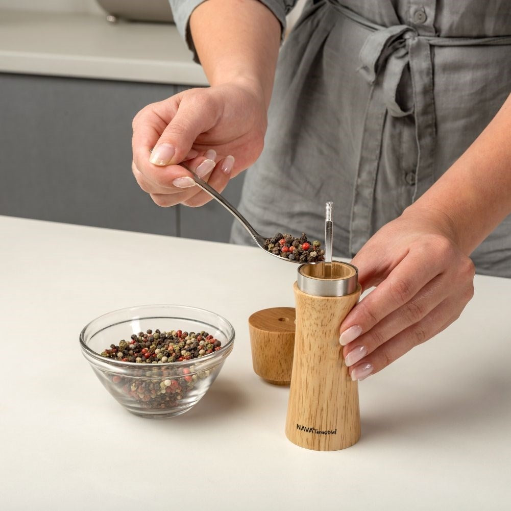 Wooden mortar in bamboo with ceramic grinders for pepper and salt