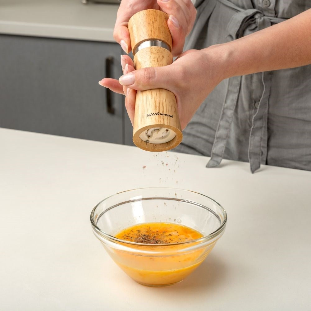 Wooden mortar in bamboo with ceramic grinders for pepper and salt