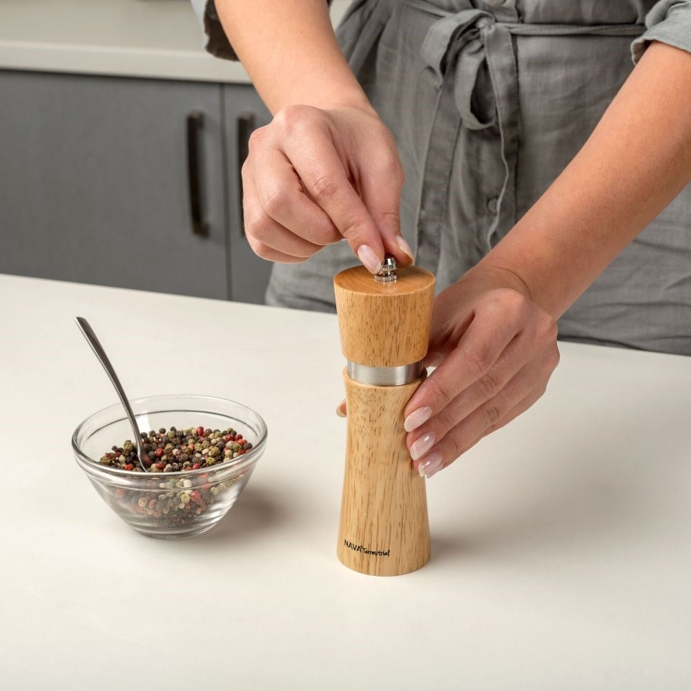 Wooden mortar in bamboo with ceramic grinders for pepper and salt