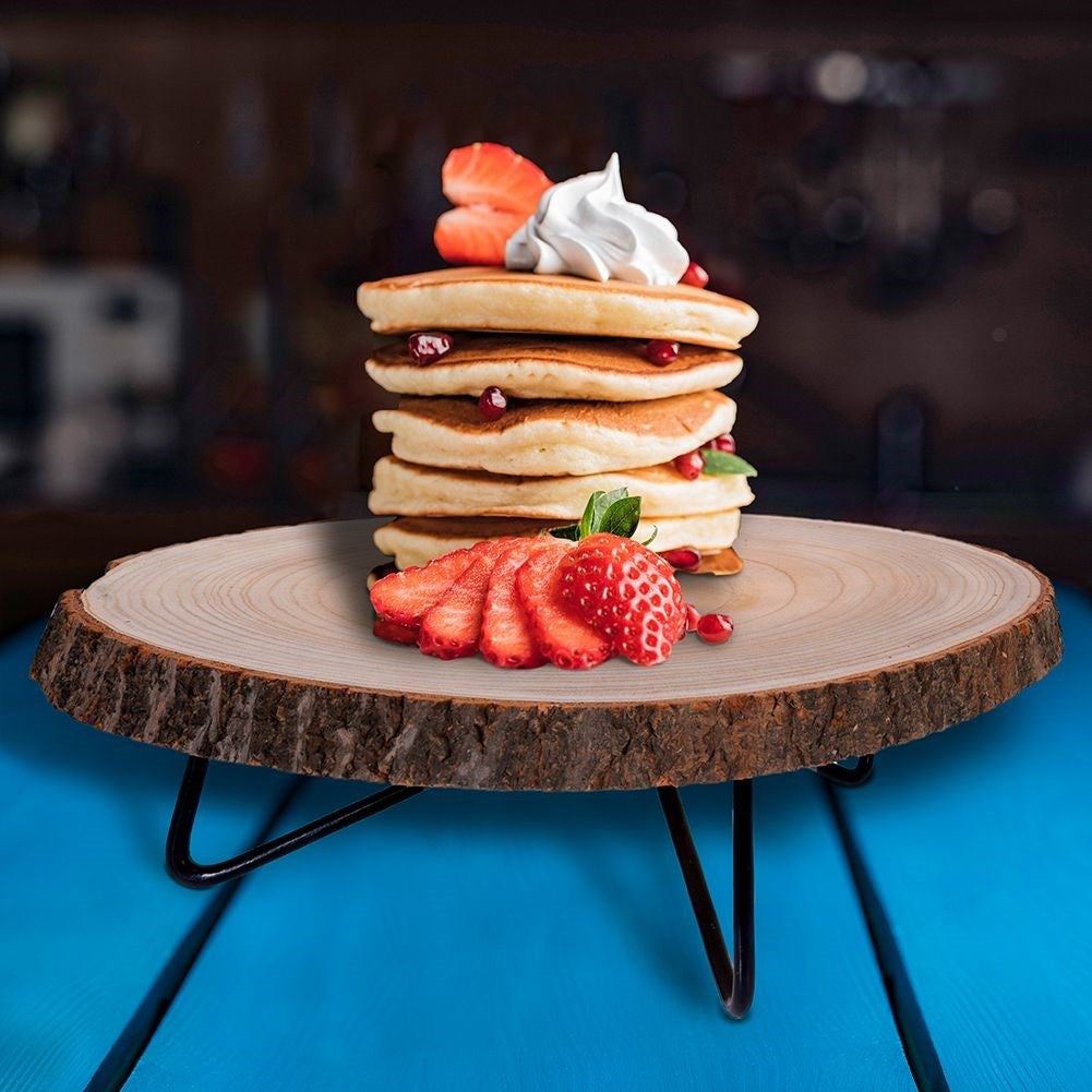 Wooden serving board with metal legs for elegant dishes