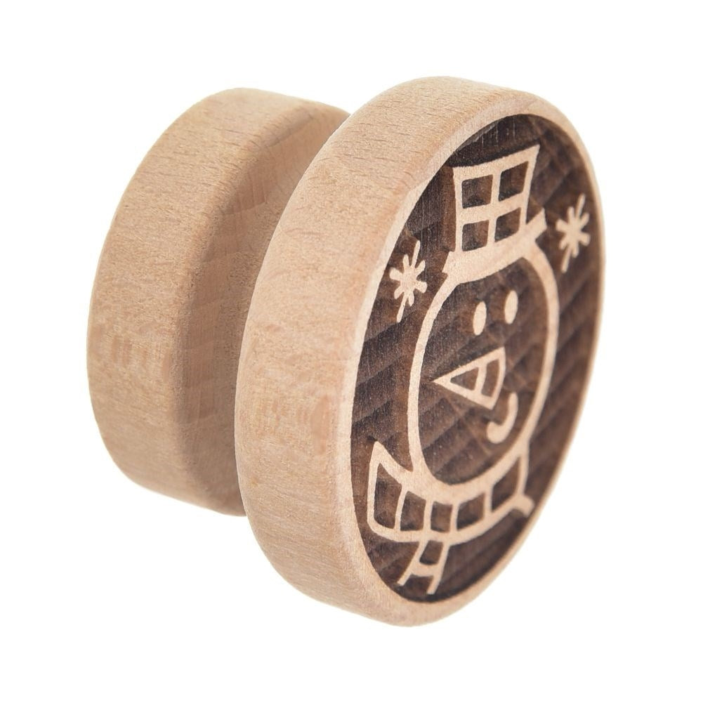 Wooden stamp with snowman motif to decorate cookies and gingerbread