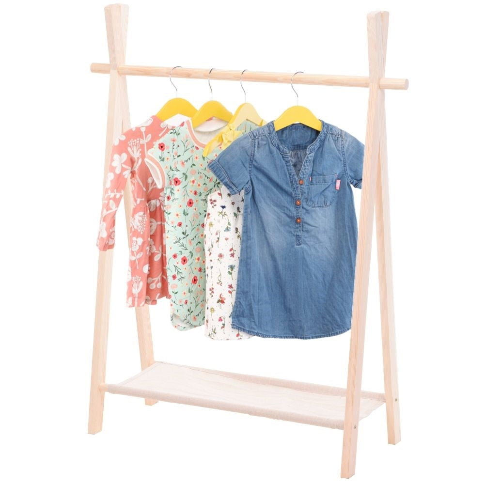 Wooden wardrobe with hangers for children's clothes and shoes